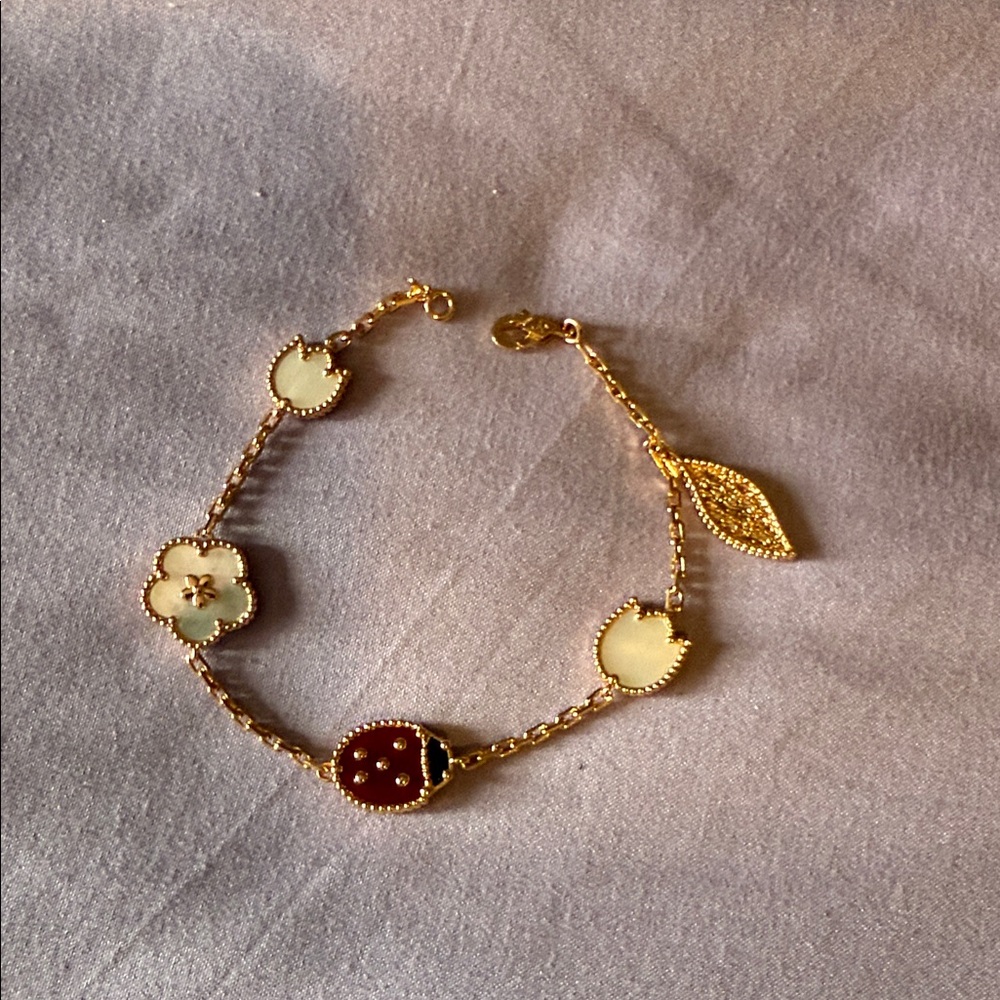 So cute lady bug blossom 🌸 bracelet 14 k rose gold plated